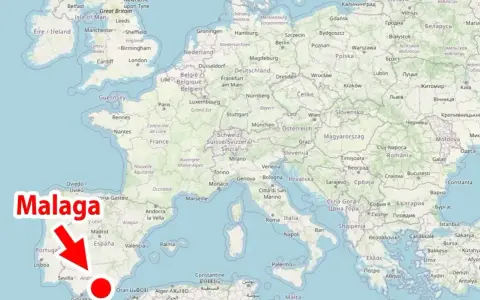 Gdzie jest Malaga? Na mapie Europy, na południu Hiszpanii, zaznaczona czerwoną strzałką i kropką.